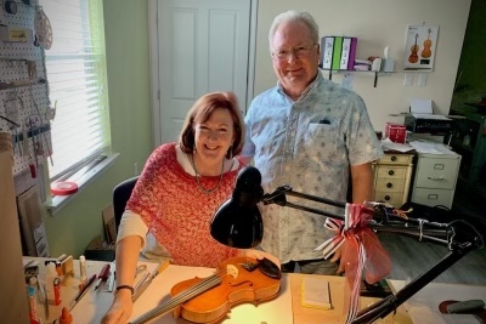John & Paula at work bench